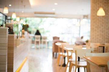 Fototapeta na wymiar Blur coffee shop with abstract bokeh