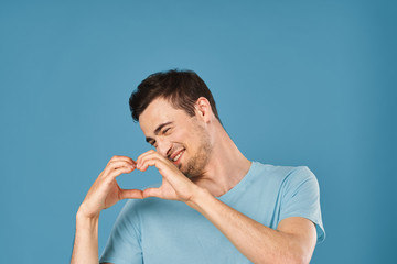 portrait of young man with glass of water