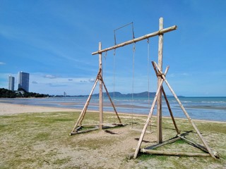 wooden pole on the beach