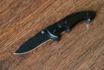 Folding knife with wooden handle. EDC knife.