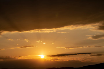 Red sunset with cloudy sky