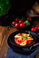 ravioli alla genovese with basil tomato sauce