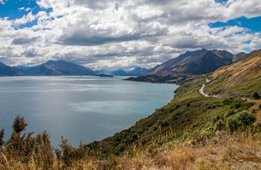 Stormy clouds over Lake Wakatipu in New Zealand looking towards the top of the lake at Glenorchy.