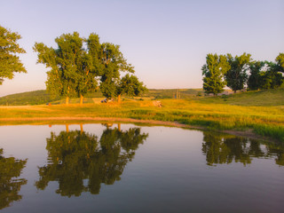 Sunset on the edge of a lake in the country, Moldova, 2019