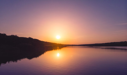 Sunset on the edge of a lake in the country, Moldova, 2019