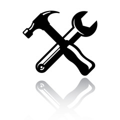 Icon hammer and spanner with a mirror shadow