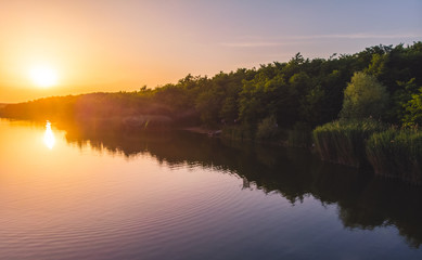 Sunset on the edge of a lake in the country, Moldova, 2019