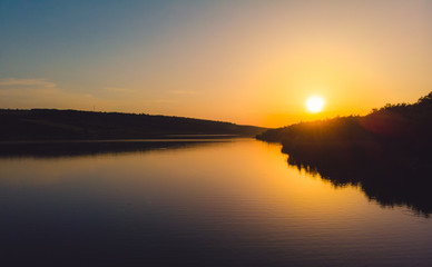 Sunset on the edge of a lake in the country, Moldova, 2019