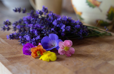 Fototapeta na wymiar bouquet of flowers on wooden table