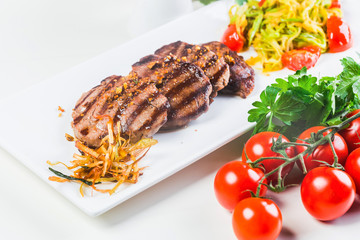 Hot Meat Dishes - Veal Medallions with Zucchini and Cherry Tomato