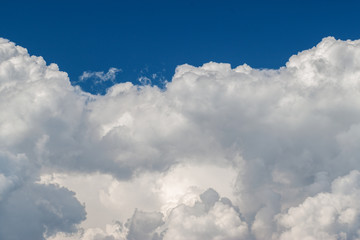 Sky with cloudscumulus clouds on clear blue sky before rain