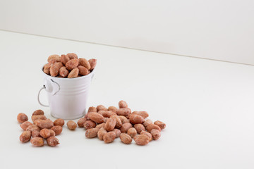 nuts in a bowl isolated on white background
