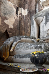 huge 11 m wide and 15 m high seated Buddha in Wat Si Chum  in famous Sukhothai Historical Park, a UNESCO World Heritage Site, the ancient 13th and 14th centuries capital of Sukhothai. Thailand