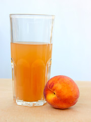 glass of  juice and fresh fruits