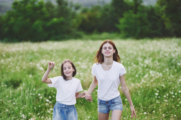 Fototapeta premium mother and daughter in the park