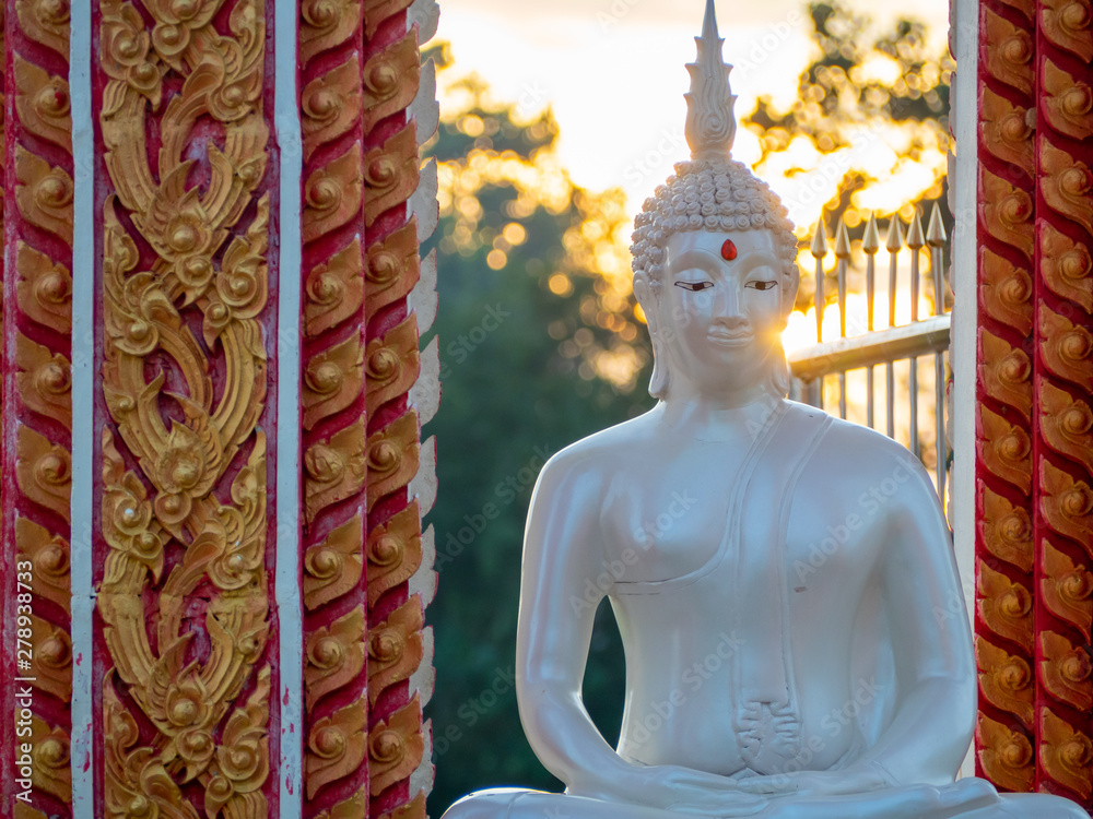 Wall mural buddha statue on temple wall