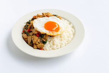 Rice topped with stir-fried chicken and holy basil, fried egg