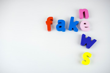 Colorful fake news letters with white background
