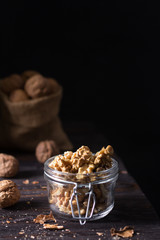 Peeled walnuts inside a glass jar