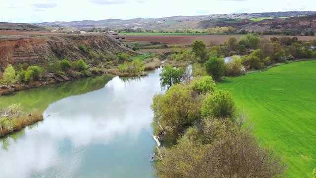 River and land aerial view.  Navarre, Spain, Europe. Drone view. 4K