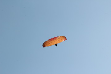 paragliding in the blue sky