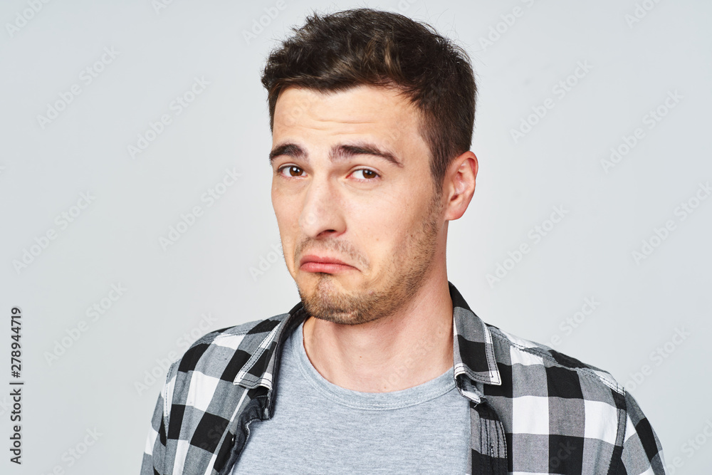 Wall mural portrait of young man isolated on white background