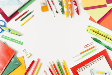 Fototapeta premium Colourful school supplies on a flat surface