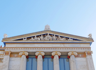 Fototapeta na wymiar Ancient greek gods and deities on a pediment of the national academy, Athens Greece