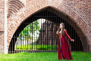 Woman in a red Renaissance dress