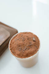 Coffee with chocolate power on top