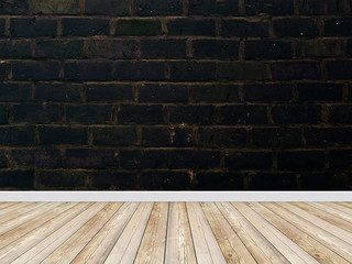 Old black brick wall in empty room with floor