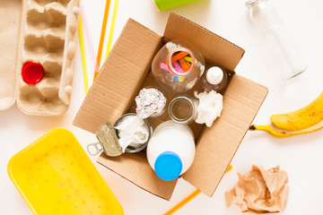 Sorting of garbage. Plastic and glass bottles, cans, paper. Waste management, sorting, recycling. 