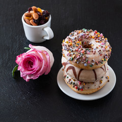 Still life donuts,sweets and rosa