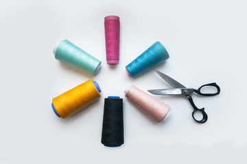 Set of sewing supplies isolated on white background