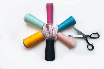 Set of sewing supplies isolated on white background