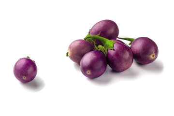 Obraz premium Group of baby purple eggplants on white background