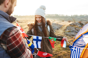 Happy young couple dressed in warm clothes