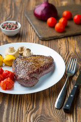 Grilled steak with vegetables