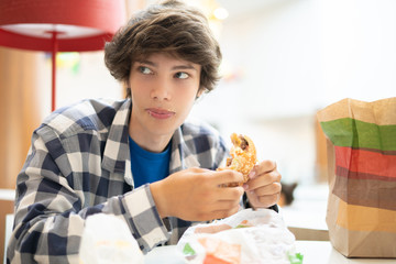 grimy smudge funny young guy eating junk fast food