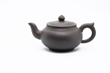 traditional Chinese teapot made of Issinclay clay, tea ceremonion, isolated on a white background