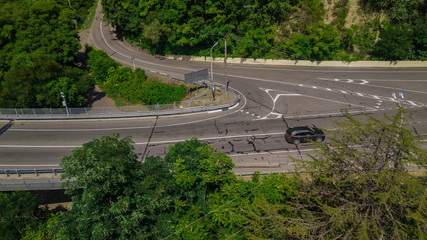 Aerial view of traffic on bridge, 2 lane road with cars