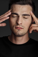 Obraz premium young man with headache