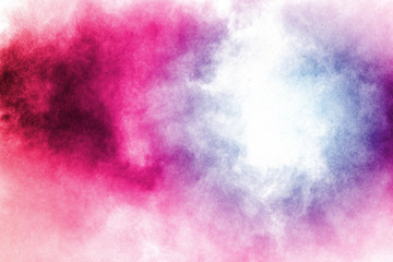 abstract color powder splattered on white background,Freeze motion of color powder exploding