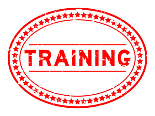 Grunge red training word oval rubber seal stamp on white background
