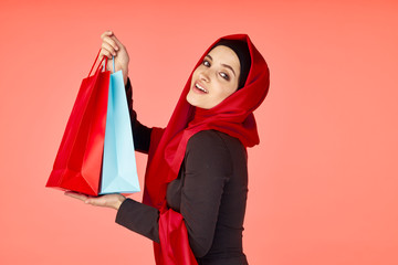 young woman with shopping bags