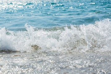 Wave of the Sea on a Beach