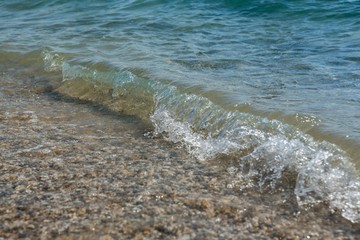 Wave of the Sea on a Beach