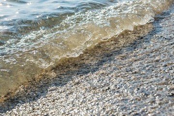 Wave of the Sea on a Beach