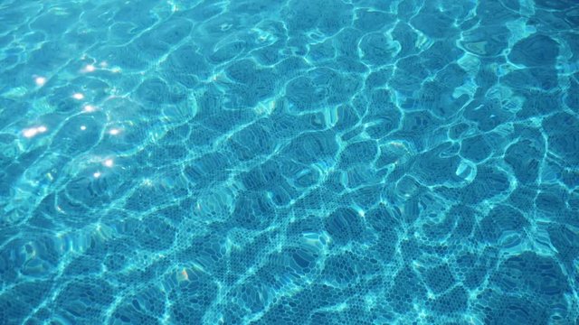 Bright azure waters in a shining swimming pool in Alanya in summer in slo-mo  