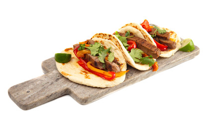Three Fajitas on a Marble Serving Board on a White Background